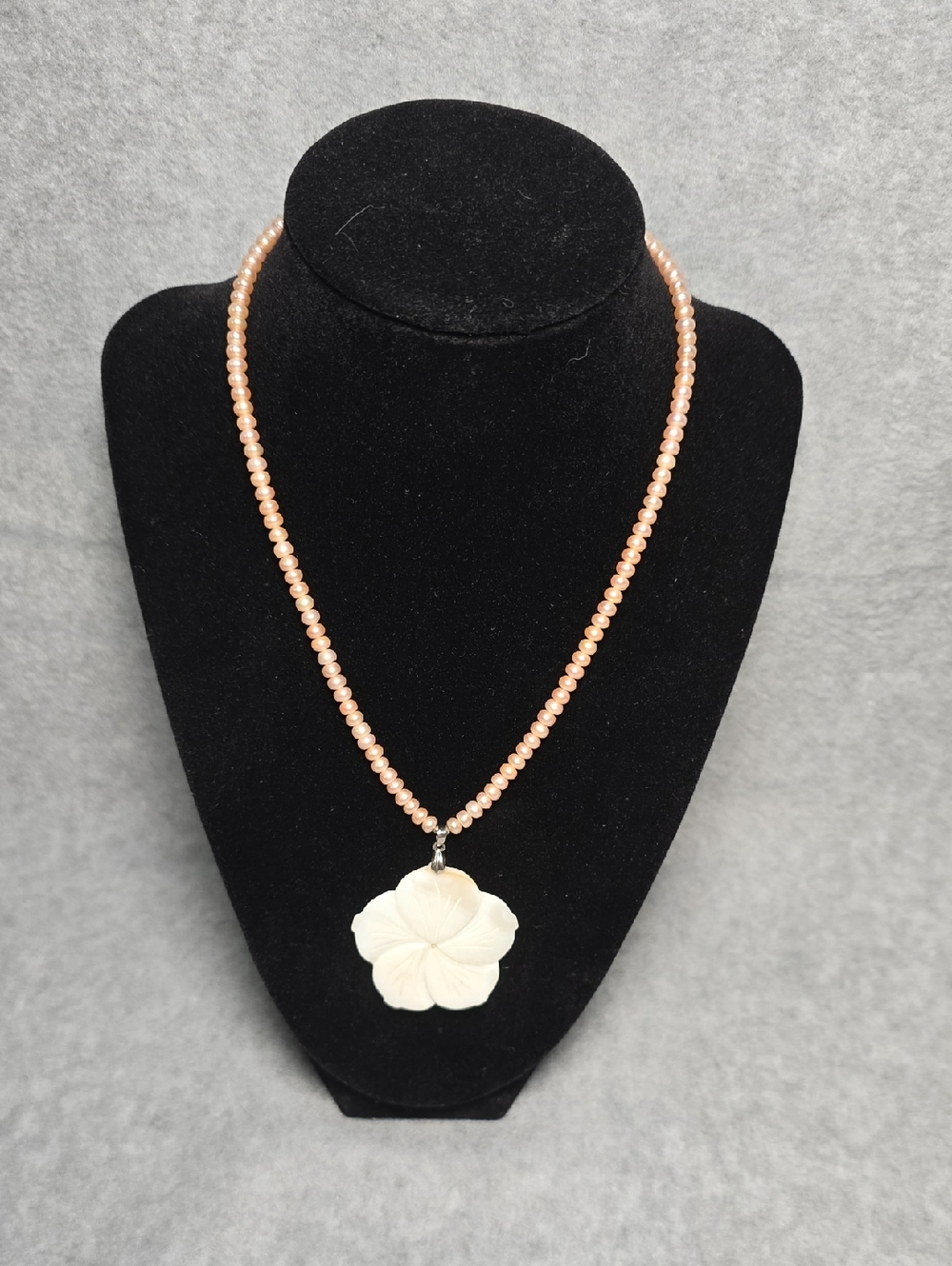 Pink Baroque Pearl Necklace Featuring a Carved Mother of Pearl Plumeria Pendant